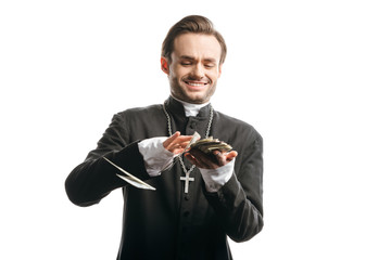 Sticker - Corrupt catholic priest smiling while counting money isolated on white