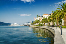 Beautiful Embankment On The Background Of Luxury Yachts At The Port Of Tivat, Montenegro.
