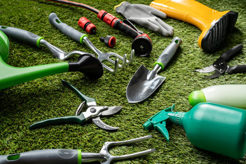 Various Gardening Tools Laying On Grass