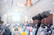 © nattanan - Microphone over the blurred business people forum Meeting Conference Training Learning Coaching Concept, Blurred background.