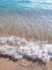 Wall Mural - Sea wave and sand beach at Waikiki beach in Honolulu, Oahu Island, Hawaii.