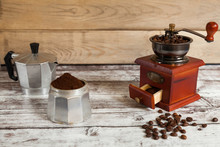 Coffee Grinder With Coffee Grains And Ground Coffee