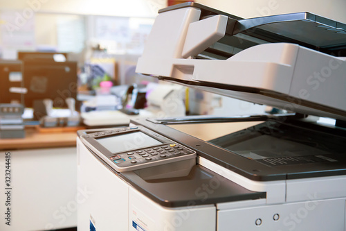Fotomural Close-up photocopier or printer is office worker tool equipment for scanning and copy paper
