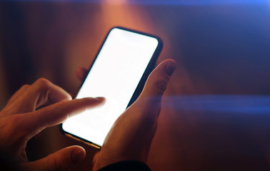 Man using smartphone outdoors