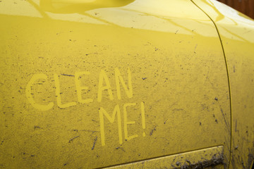 Write words inscription text clean me very dirty surface car. Concept car wash.