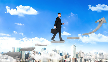 Wall Mural - Business man climbing up stair steps to career success with business district and horizon skyline as background. Concept of business goal success, growth of career path and starting up a new business.