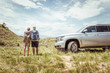© MACO - Father and son hiking in a rural prairie setting. Bridger, Montana, USA