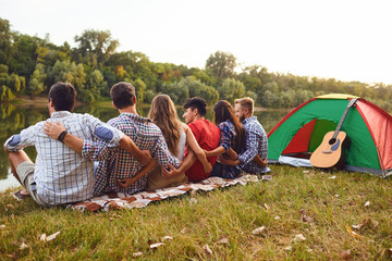 Wall Mural - Group of people smiling standing on a picnic