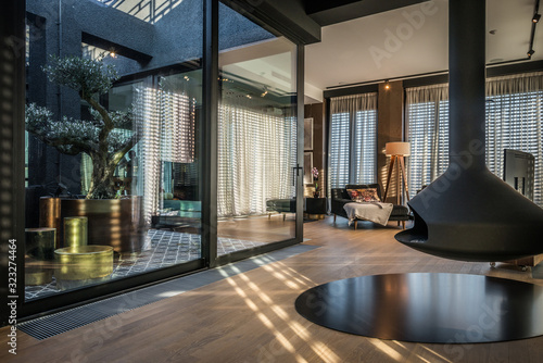 Cuadros en Lienzo Interior of a luxury open plan apartment with fireplace