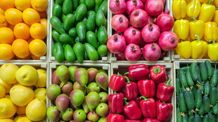 Wall Mural - Fruits and vegetables at a showcase in a supermarket