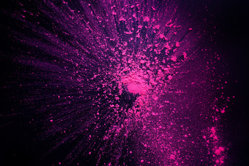 Wall Mural - freeze motion of pink powder exploding, isolated on black, wallpaper with copy space.