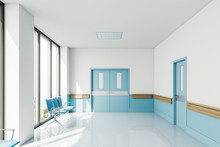 Empty Hospital Corridor With Chairs