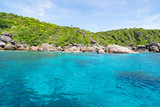 Fototapeta Boho - Beautiful tropical island with sea water surface in summer season.