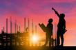 © JU.STOCKER - Silhouette of Engineer and worker with clipping path on building site, construction site at sunset in evening time.