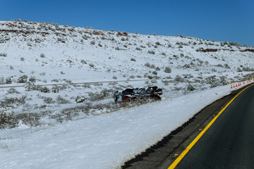 Wall Mural - Transportation trailer truck of car on semi-trailer on new cars on the highway hauler accident truck drives through cold weather conditions