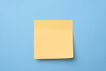 Yellow Sticky Note On Light Blue Background