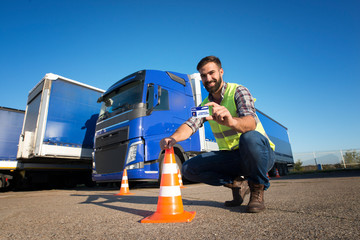 Wall Mural - Truck driving school and CDL training. Driver candidate successfully finished truck driving training and acquired commercial driving license.