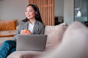 Asian woman is working in office