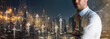 © whyframeshot - caucasian business man standing formal shirt standing business organization startup concept double exposure digital stock market chart and arrow direction growth with dountown building city night time