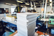 © Dusan Petkovic - Picture of printing shop interior. Selective focus on pile of sheets.