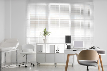 Doctor's office interior with modern workplace in clinic