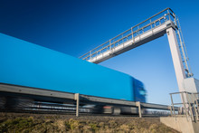 Truck Passing Through A Toll Gate On A Highway, Highway Charges, Motion Blurred Image