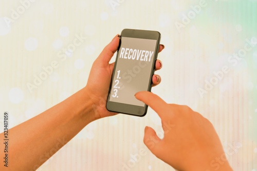Cuadros en Lienzo Conceptual hand writing showing Recovery