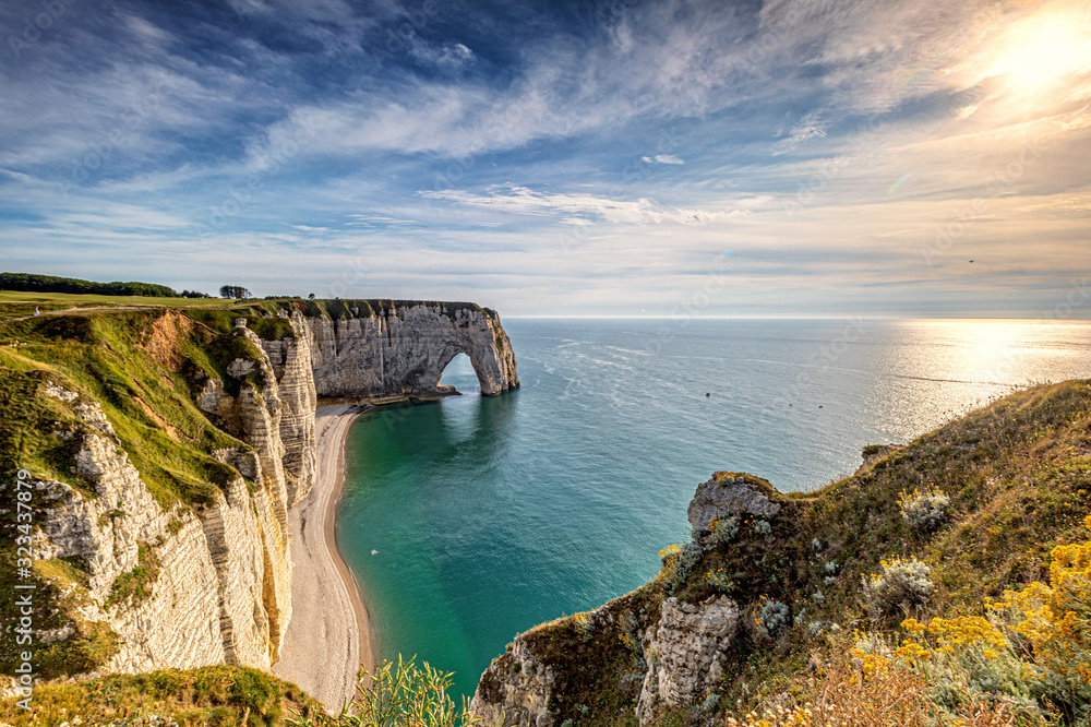 Nature has carved fabulous shapes out of the white cliffs at Etretat.The extraordinary site drew Impressionist painters aplenty.  - obrazy, fototapety, plakaty 