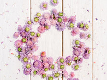 Floral Wreath. Purple Mums Composition. Circle Frame Of Open Flower Buds On White Wooden Background.