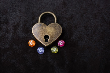 Wall Mural - Love shaped padlock, key and love wording