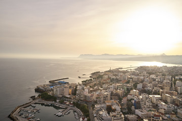 Panoramic drone aerial view from above of the city of Chania, Crete island, Greece. Landmarks of Greece, beautiful venetian town Chania in Crete island. Chania, Crete, Greece.