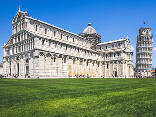 View of the tourists in front of the Pisa tower and the Pisa Cathedral