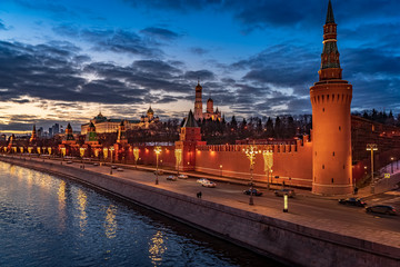 Wall Mural - Top angle view of the city of Moscow with Moscow River and Moscow Kremlin in winter at sunset. Travel destination Moscow, Russia