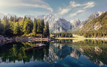Wonderful Nature Landscape. Amazing Mountains Lake During Sunset. Awesome Alpine Highlands In Sunny Day. Picture Of Wild Area. Fusine Lake. Italy, Julian Alps. Best Travel Locations.