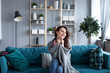 © BestForYou - Young beautiful woman relaxing on a cozy sofa at home.