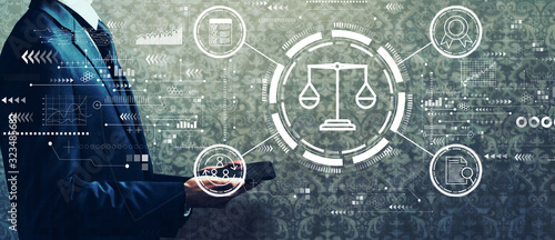 Fotomural Legal advice service concept with businessman holding a tablet computer