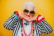 © oneinchpunch - Funny grandmother portraits. Senior old woman dressing elegant for a special event. granny fashion model on colored backgrounds
