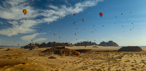 Winter at Tantora Hot Air Balloon Festival over Mada'in Saleh (Hegra) ancient site, Al Ula, Saudi Arabia