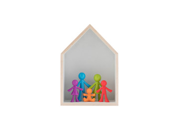 Poster - Colorful family figurines in wooden house on white background with clipping path