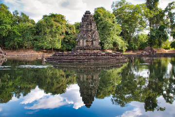 Neak Poan is an artificial island with a Buddhist temple on a circular island in Cambodia