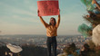© koshkin_stock - Activist young woman holding encouraging red poster This is our future standing at landfill site with garbage nature environmental community earth eco environment outdoor recycle trash slow motion