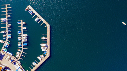 Poster - drone photo above the lake of Zug with a boat bridge