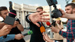 © Svitlana - No news. Journalists trying to conduct interview of politician. Journalism industry, live streaming concept.