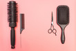 © etonastenka - Flat lay composition with hairdresser set on pink background. Barber set with tools and equipment: scissors, combs and hairclips with copy space for text