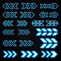 Wall Mural - blue neon 3d arrows set on black brick wall background. shining led light sign showing left and righ