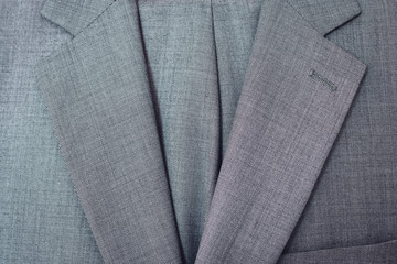 Wall Mural - Close up of light grey woolen suit.