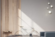 © Who is Danny - Contemporary hipster interior with bicycle and blank wall.