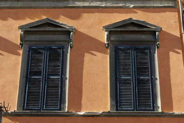 old window with shutters