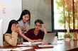 © Watcharin - Young business people working ,with colleagues team meeting,busy time,at office