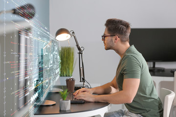 male programmer working in office